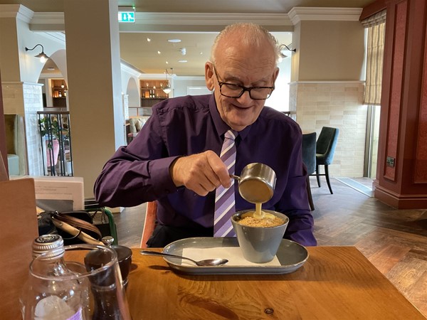 Image of a person at a table