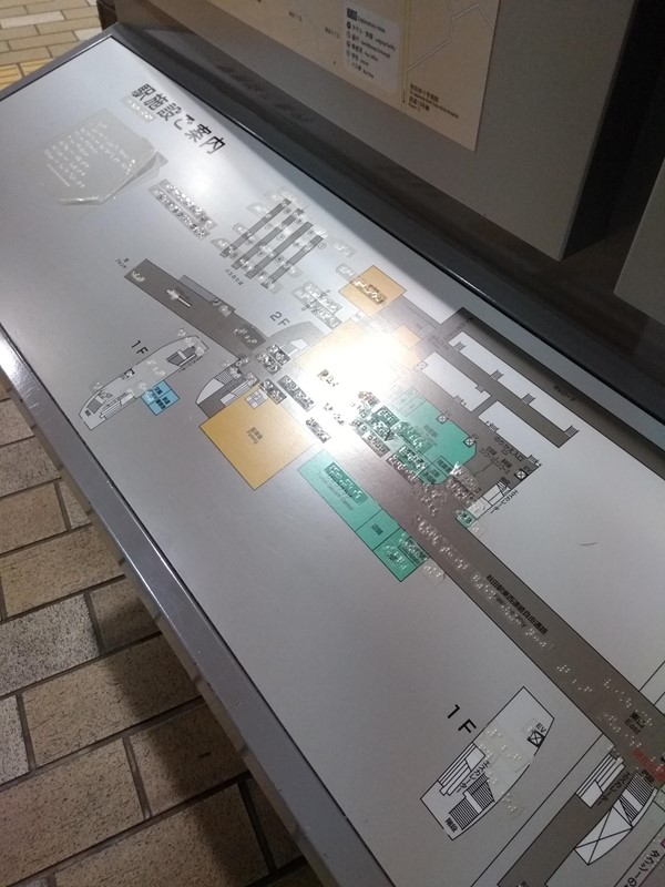 Tactile map of the station with braille labels.