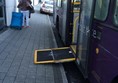 Bus with wheelchair ramp.