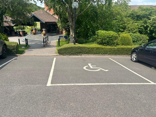 two allocated blue badge parking spaces