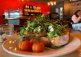 Smashed Avocado and feta on chunky toast with vine tomatoes.  Delicious.