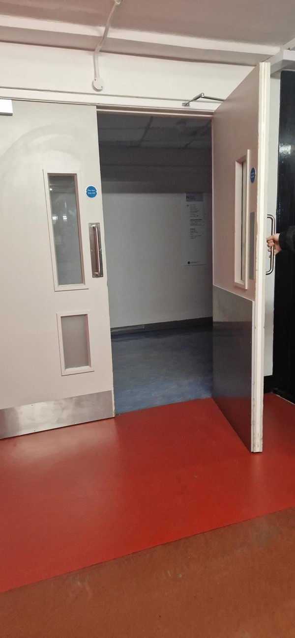 Image of a double door being held open