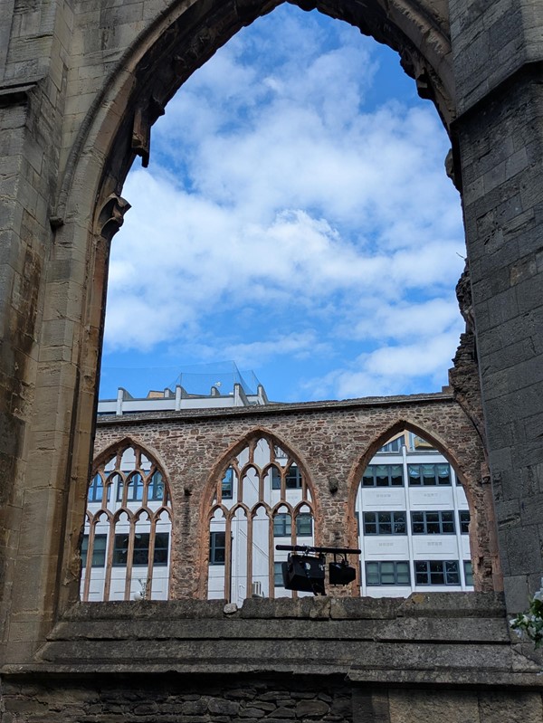 Image of sky through stone window