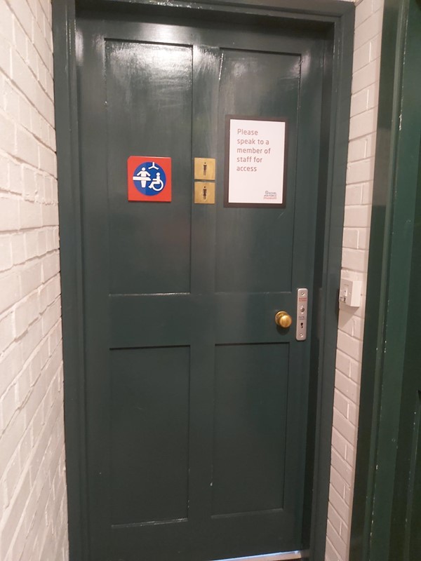 Toilet door with Changing Places logo