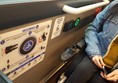 Dedicated wheelchair space with quantum wheelchair securement system.