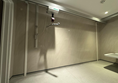 Image of ceiling hoist and remote to operate