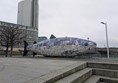 Image of big fish statue, there are steps on one side