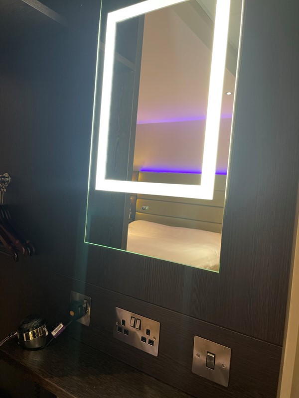 The mirror was too high for me to use in my wheelchair. The bottom light strip was level with my face