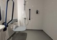Image of shower in the accessible toilet of a hotel room