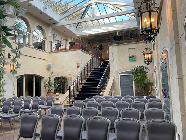 A very nice building, well lit and has natural lighting provided by its glass roofed ceiling