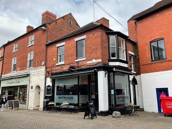 Opposite the Buttercross, a small cafe