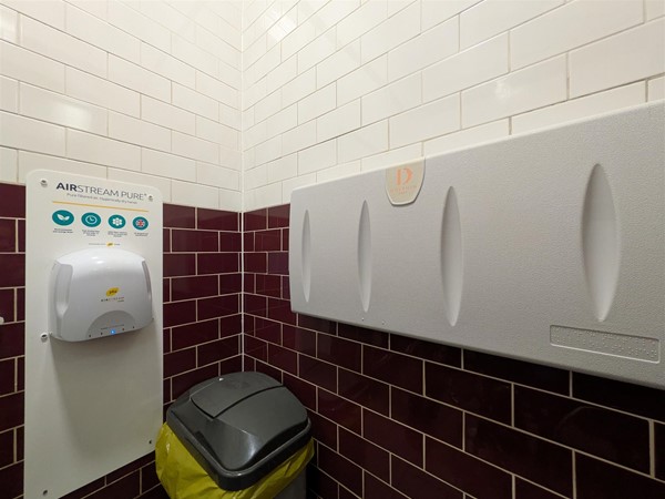 Image of dryer and baby change in the accessible toilet