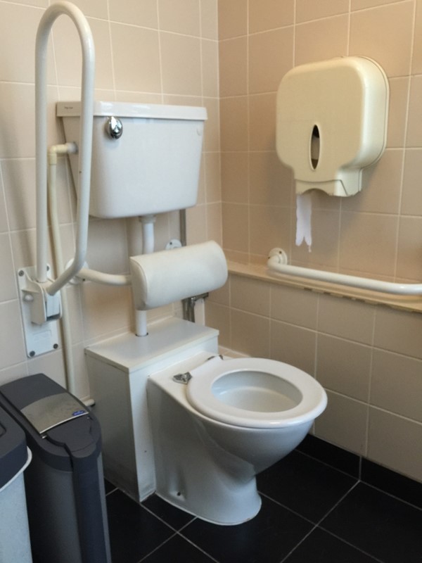 The accessible public toilet by the bar and restaurant.