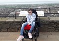 Picture of a wheelchair user on the castle wall