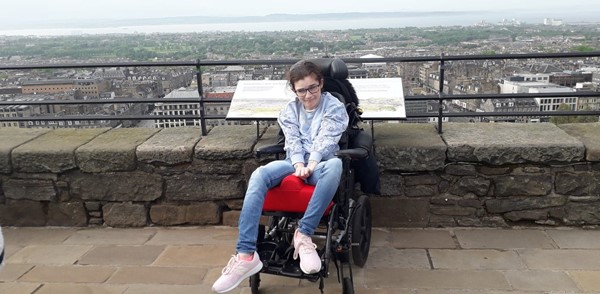 Picture of a wheelchair user on the castle wall
