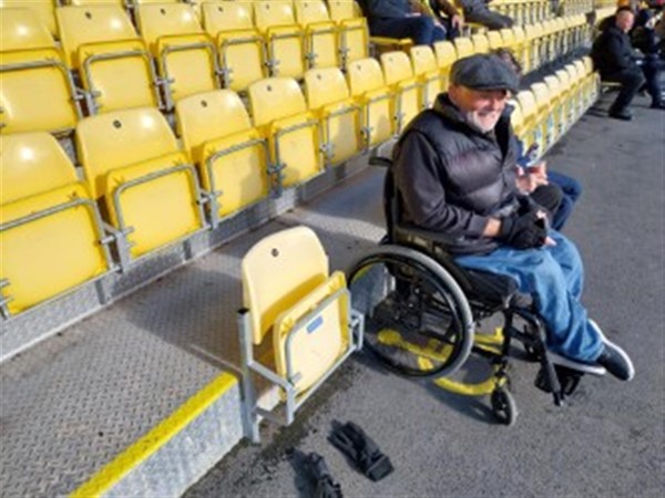 Level seating directly next to the pitch