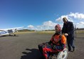 Being wheeled to the plane