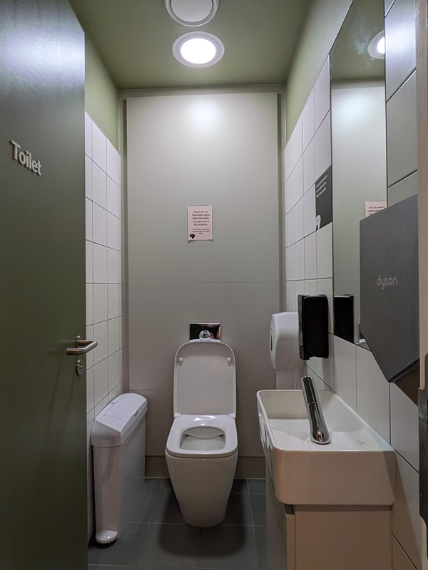 image of the inside of a gender-neutral bathroom