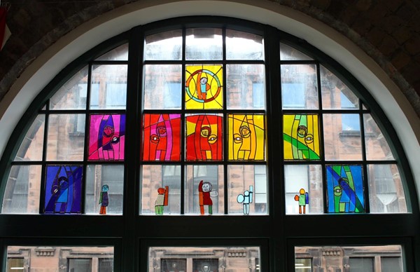 A beautiful colourful window in the Project Ability studios