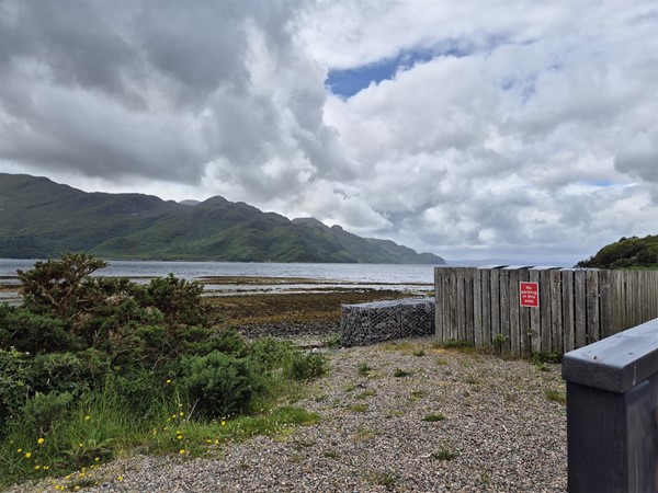 Image of a loch and mountain