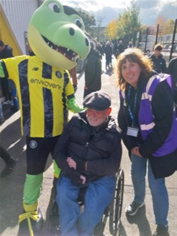 First class assistance from the Clubs Disability Access Officer (and Harrogate Town Mascot - Harry Gator)