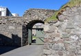 Main entrance with hatch through left door.