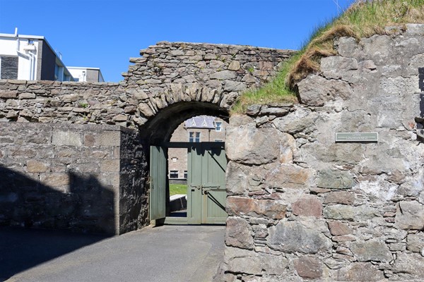 Main entrance with hatch through left door.