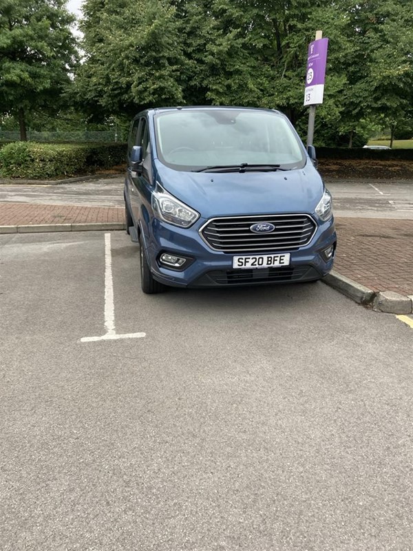 Image of a van parked in a parking space