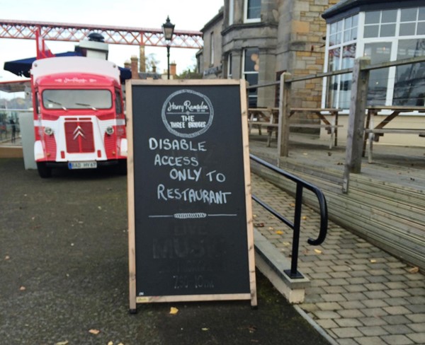 Signposting for accessible entrance.
