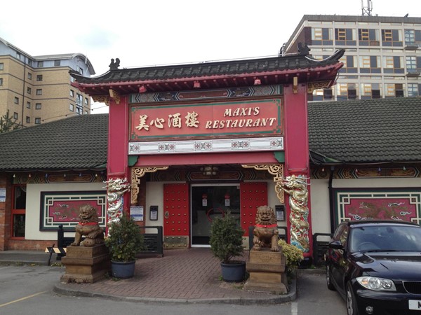 Front entrance to the restaurant, small dropped curb to enter. Double glass doors but they aren't automatic.