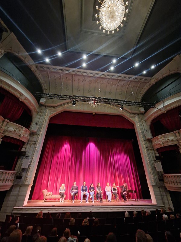Image of people on a stage