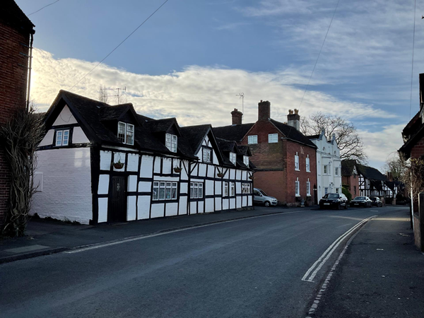 Picture of a cottage on the main road