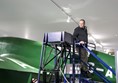 Image of someone climbing down stairs attached to a plane