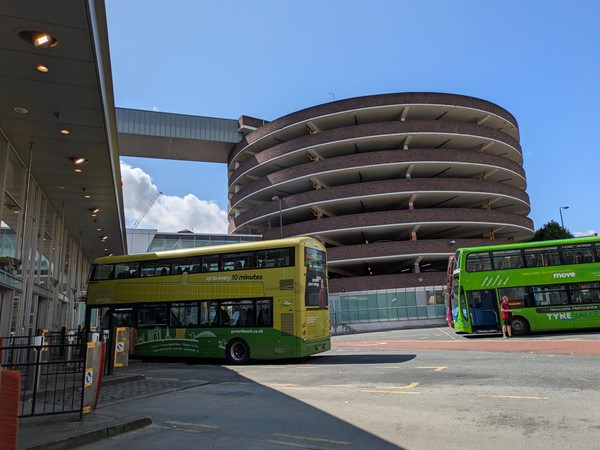 Image of a bus parked at a stance
