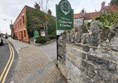 Sign saying "Welcome to Chalice Well & Gardens"