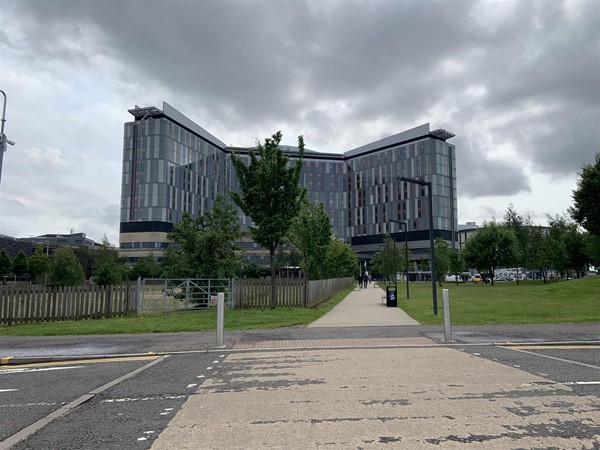 image of the main building of Queen Elizabeth University Hospital from a distance