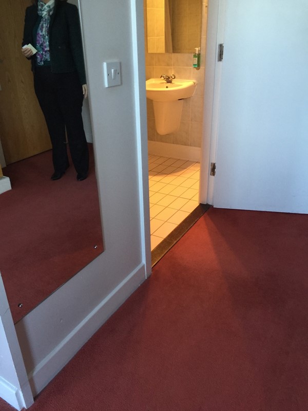 An accessible bedroom, bathroom door