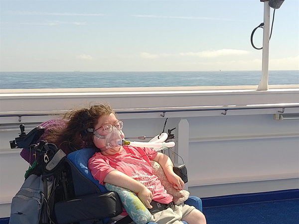 Image of a wheelchair user in a ferry deck