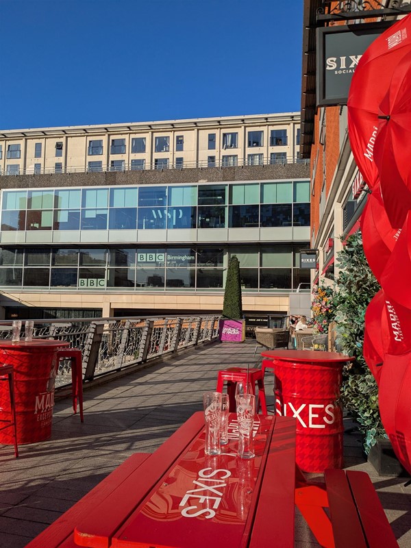 Image of seating area outside Sixes