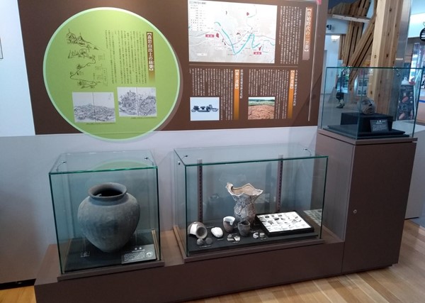 Photo of stone age pottery and sculptures in the local history museum.