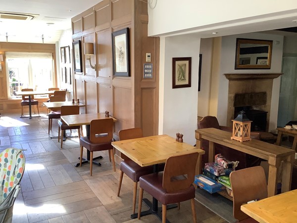 There is room for sitting to dine in at the dining area known as the conservatory, although no glass roof, but it is comfortable and pleasant