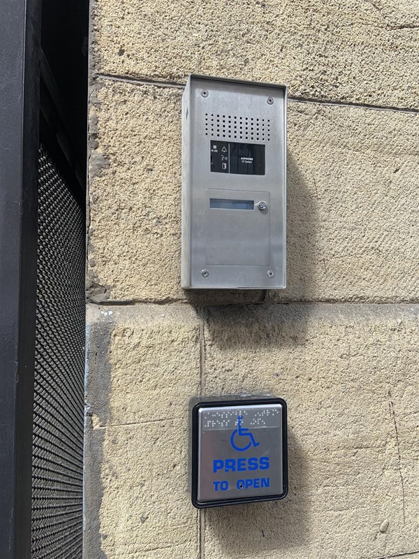image of the intercom and door open button on the outside