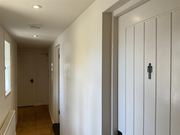 Image of a toilet door