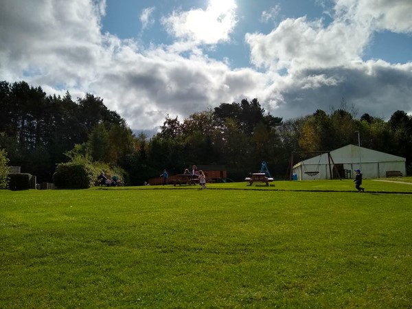 Outside picnic benches through out the site