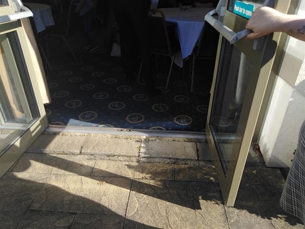 The fire door access has a slight lip to get over.