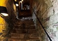 Example steps / lighting into the ruins. Handrails are not available on all stairs.