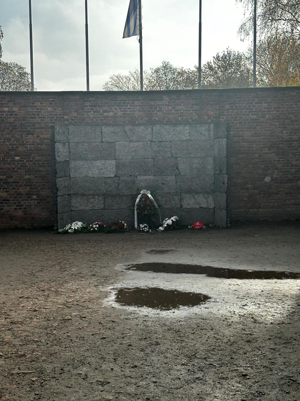 This is the wall of death in Auschwitz I where prisoners would be lined up and executed by firing squad