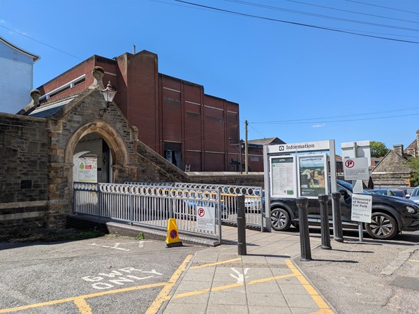 Image of entrance to station via car park and walkway