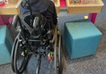 Visiting wheelchair user