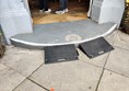 The rubber wedges which serve as a ramp at the step of the main entrance.